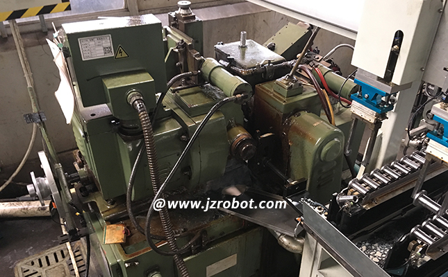 無心外圓磨床機械手導(dǎo)輪定位